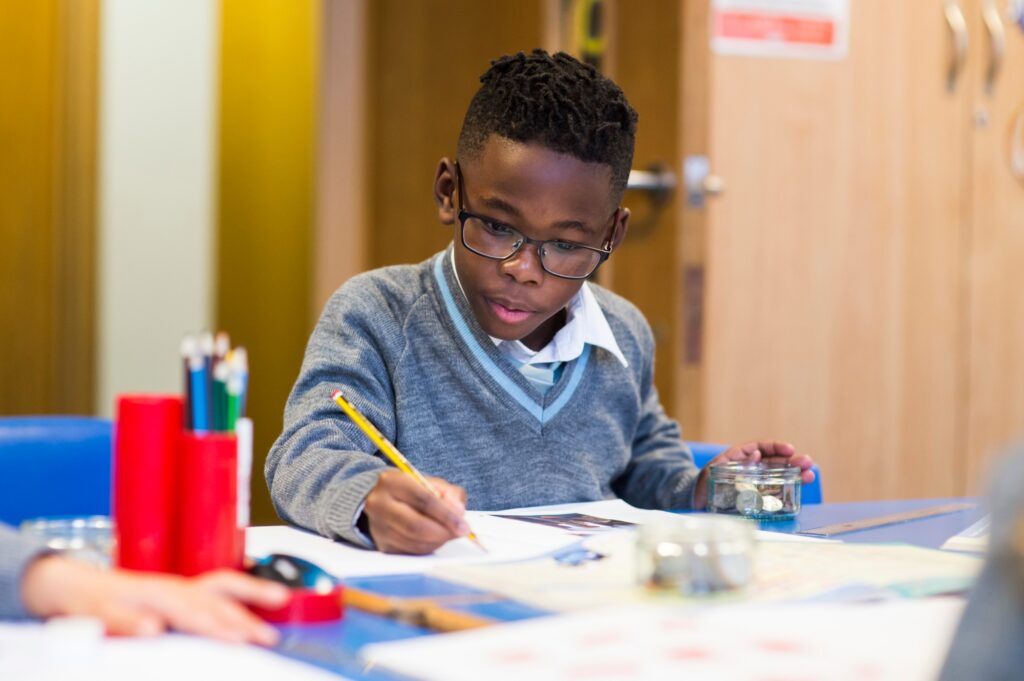 School Boy Writing